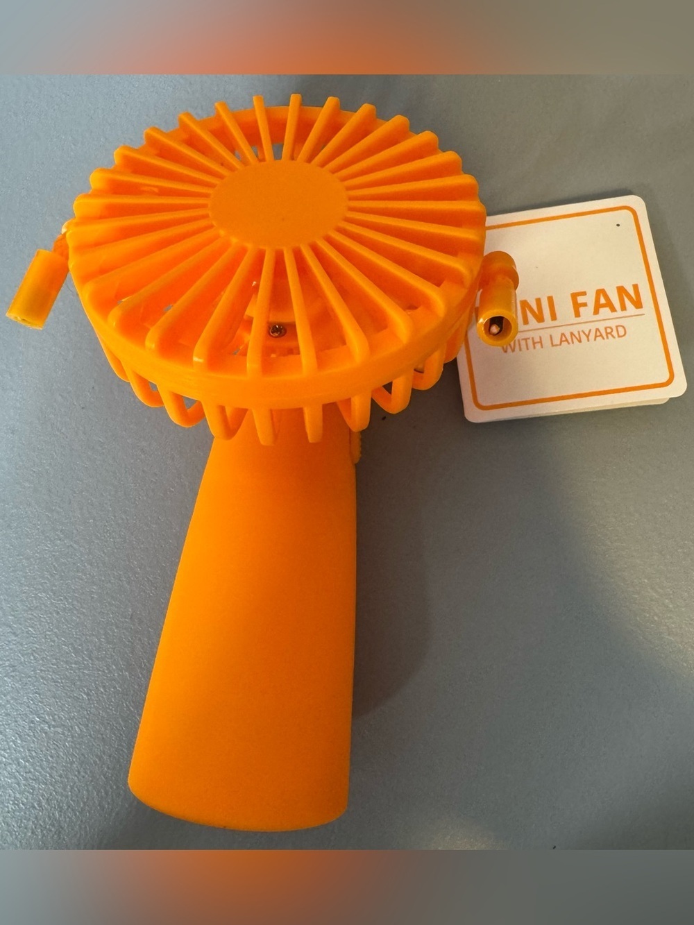 Portable Mini Handheld Fan - Bright Orange with lanyard travel summer beach